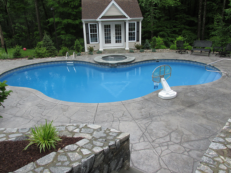 Swimming pool and stamped concrete project example 25